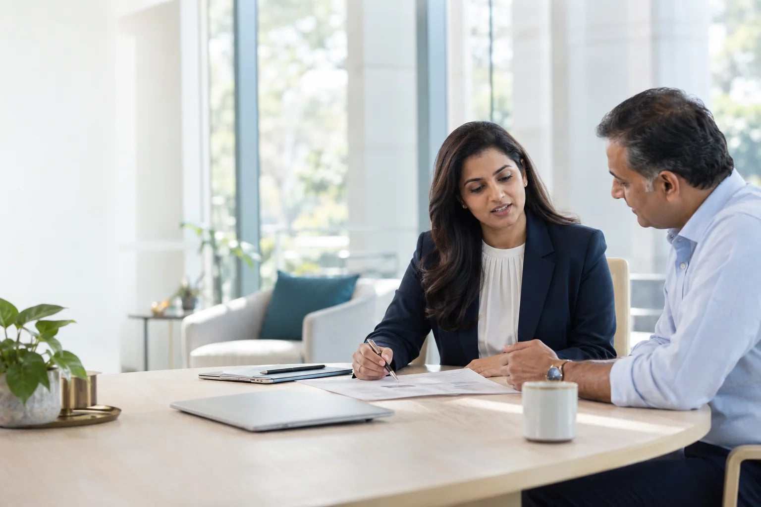 Original illustration of two financial-services professionals discussing a regulatory review in a bright contemporary office.